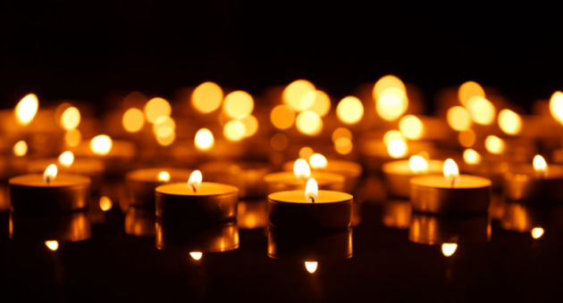 Foto's van brandende waxine lichtjes