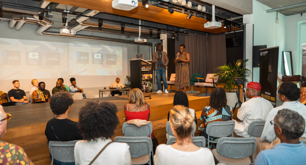 Sprekers en publiek tijdens het Speak Out Event Den Haag