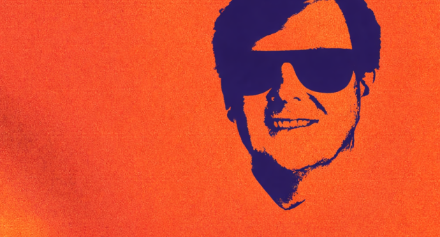 Een abstracte afbeelding van een gezicht op een oranje achtergrond.