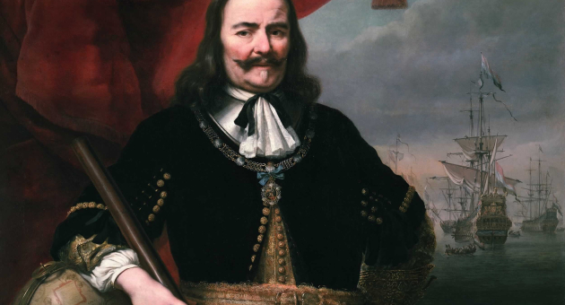Historisch portret van een man met een baard, gekleed in een luxe outfit met schepen op de achtergrond.