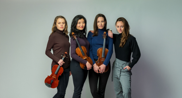 Spaceship Ensemble + Pi Quartet. Four violinists pose with their instruments.