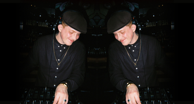DJ Ginger ILL behind the decks during a late-night performance