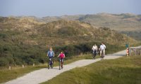 Fietsen door de duinen