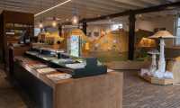 Inside De Tapuit, visitorscentre Dunea,, an informative space with books and exhibits.