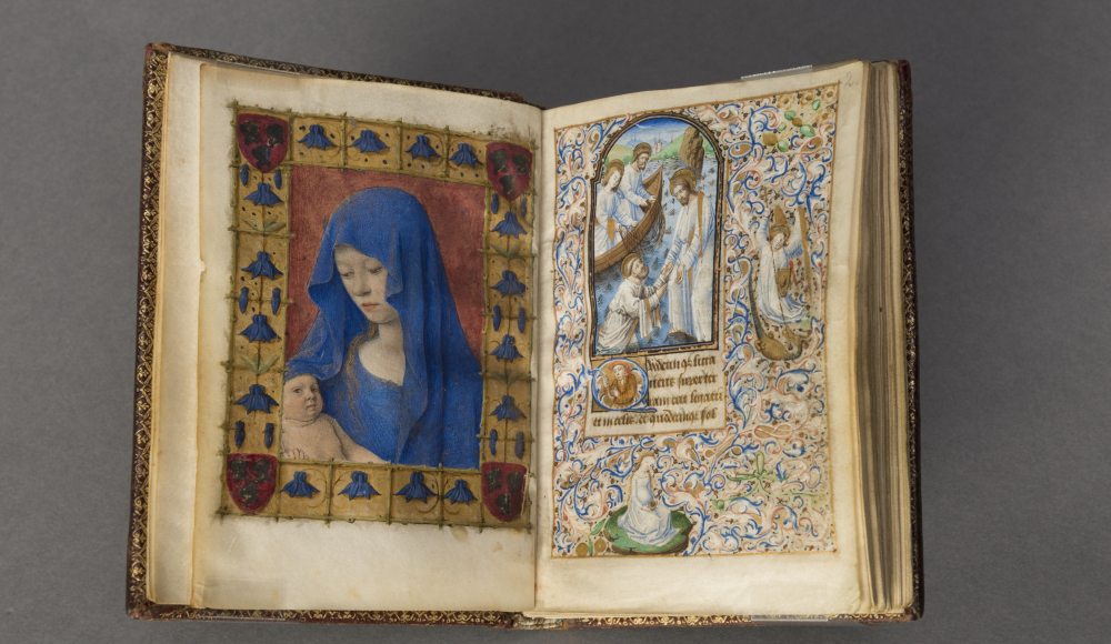 Middeleeuws gebedenboek met kleurrijke miniaturen van Maria met kind en religieuze scène met bladgouddecoratie