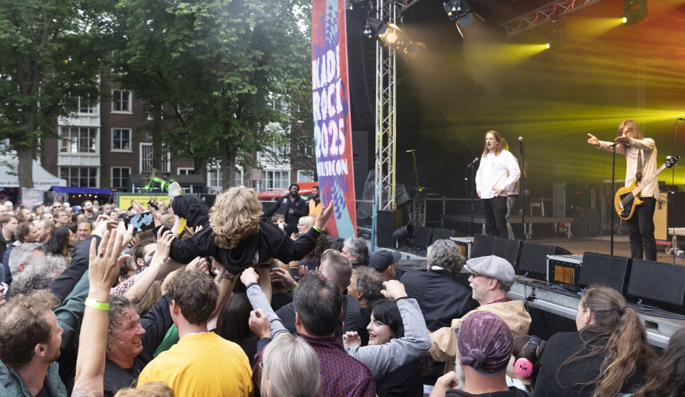 Medium-sized crowd enjoying a live performance
