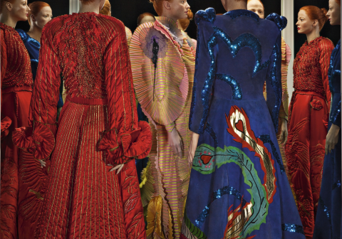 Various colorful dresses in a fashion display. Three designs from Fong-Leng: Velazquez (1975), Rups (1975) and Phoenix (1974).