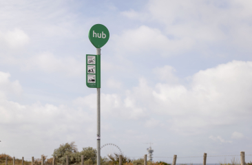 Road sign displaying information about the Hub in Scheveningen