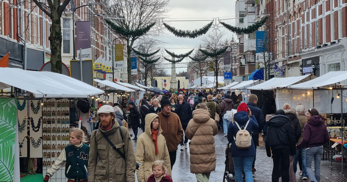 Busy winter market in Weimarstraat, The Hague Busy winter market in Weimarstraat, The Hague