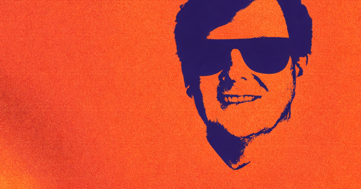 Een abstracte afbeelding van een gezicht op een oranje achtergrond.