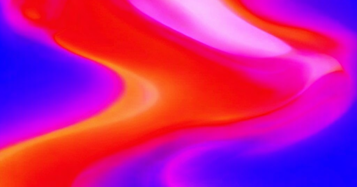 Golven van levendige kleuren in roze en blauw.