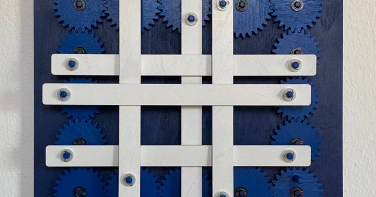An abstract artwork featuring blue and white gears.