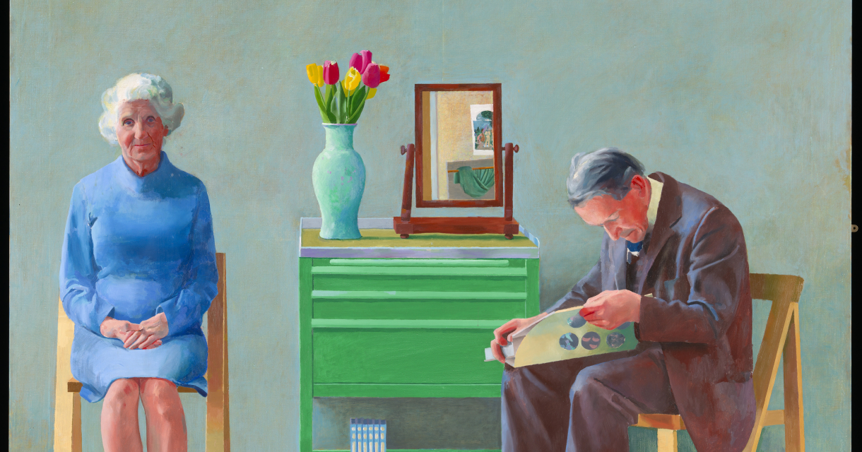 Painting of an elderly woman and man sitting on chairs next to a green cabinet with tulips and a mirror on top ©David Hockney