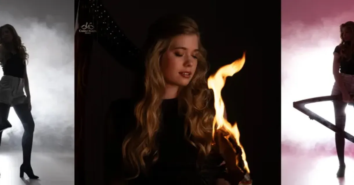 Vrouw in zwart met vurige props en rok in een artistieke pose