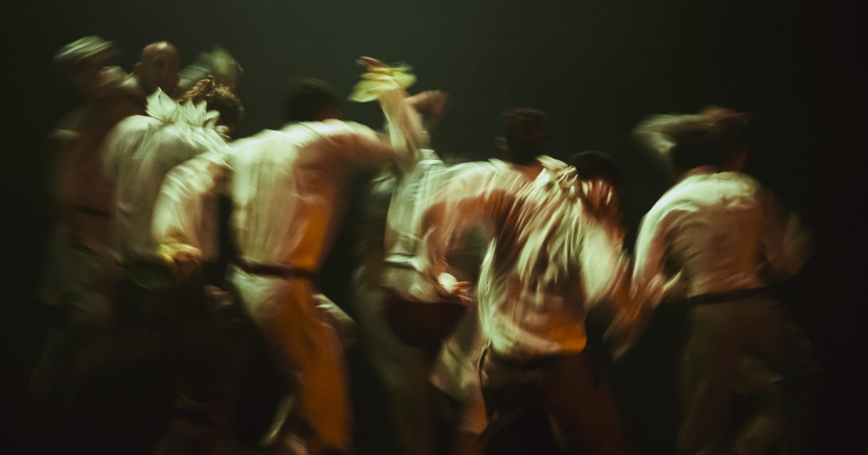 NDT 1 dancers in an atmospheric scene from Out of the Stillness on stage at Amare